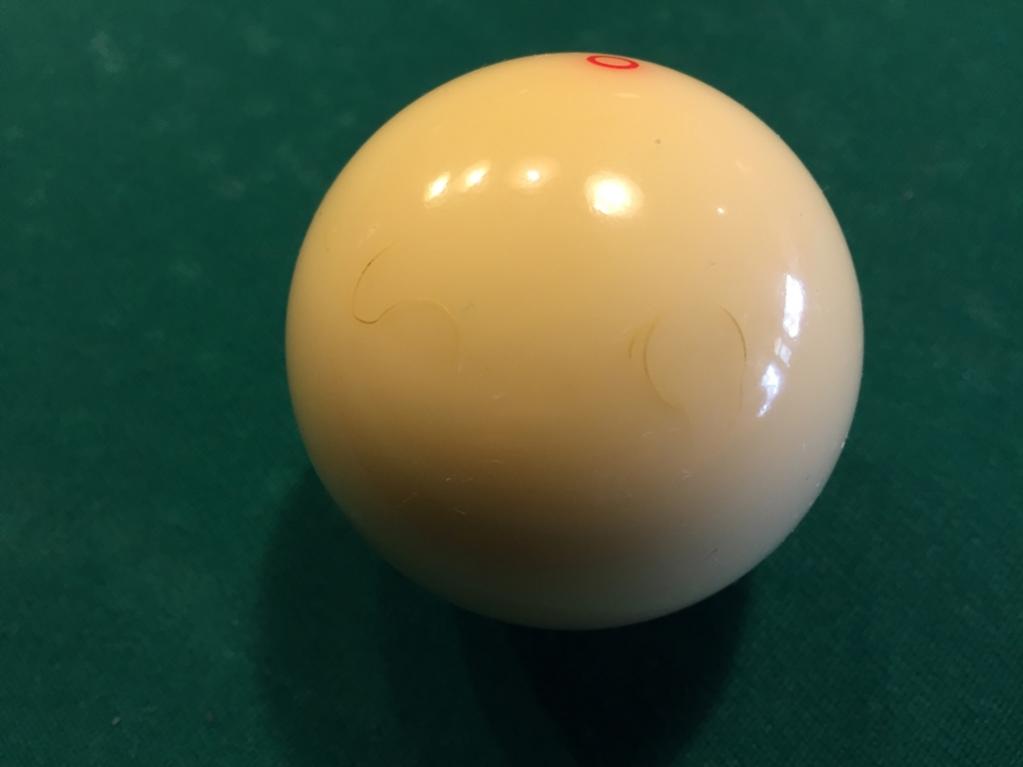 cue ball damaged by phenolic tip